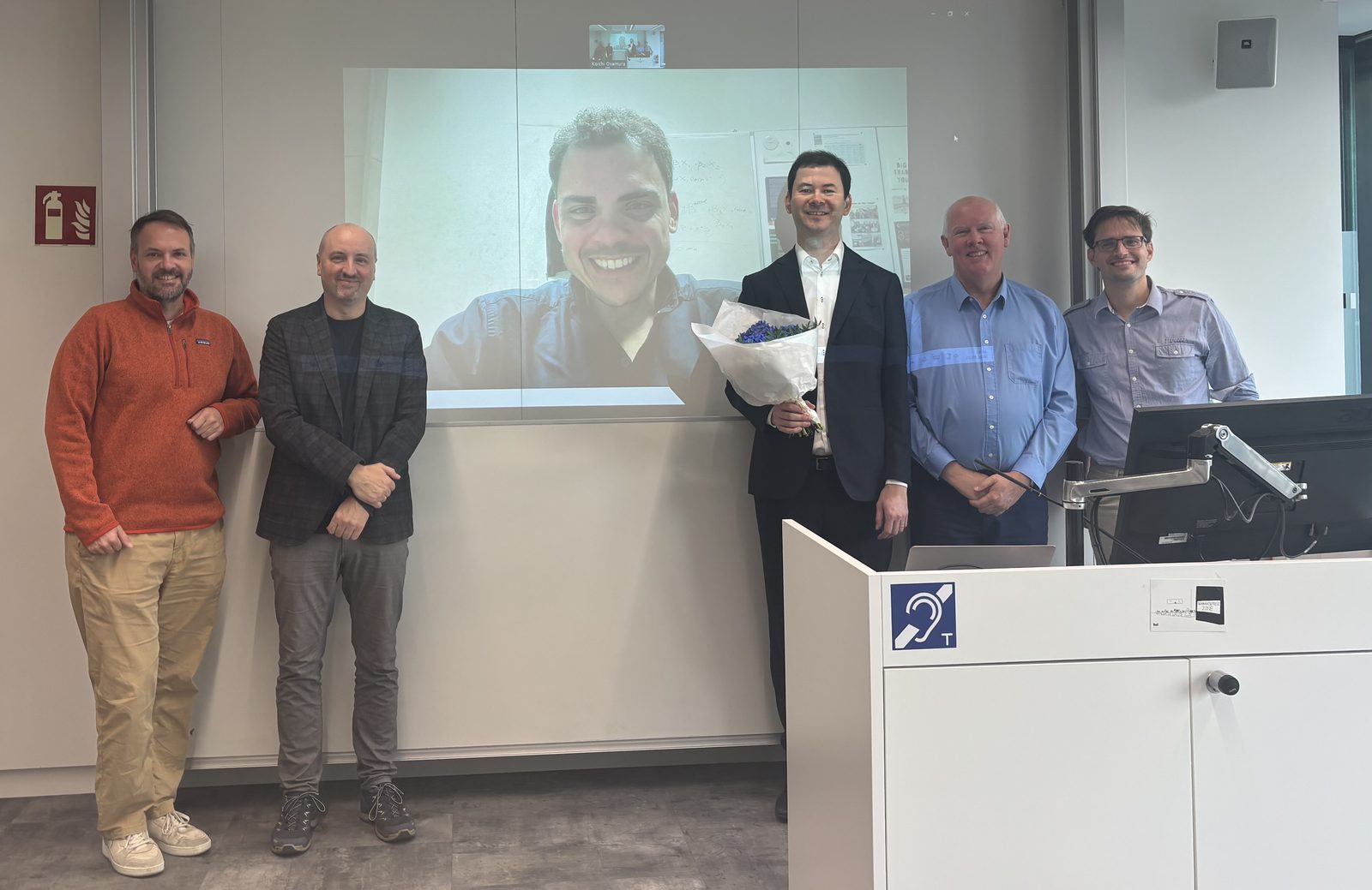 Koichi Osamura with his committee and supervisors after the defense
